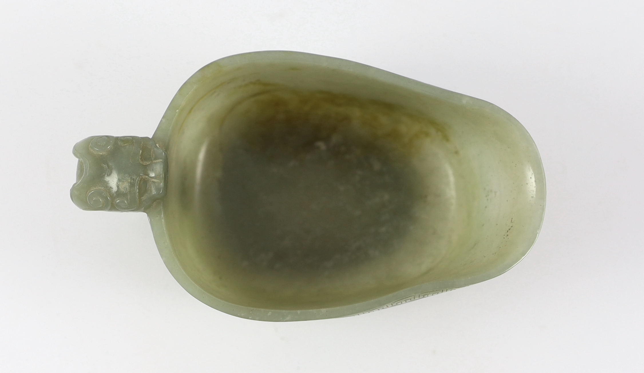 A Chinese celadon jade pouring vessel, yi, 17th/18th century